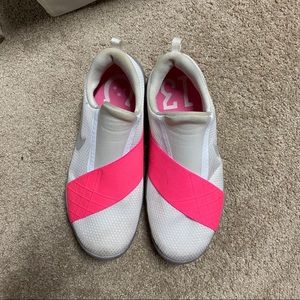 Nike slip on white and pink shoes